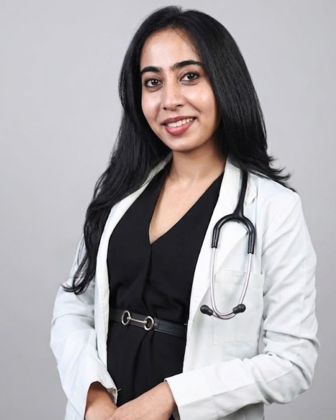 WhatsApp Image 2026-07-10 at 164953 3 | Dr Swetha Cosmodermcentre Smiling female doctor in a white coat with a stethoscope draped over her shoulders.